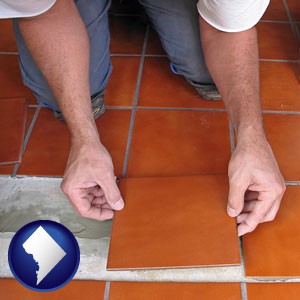 a tile worker laying ceramic floor tile - with Washington, DC icon